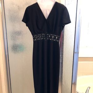 Formal black dress with lace section